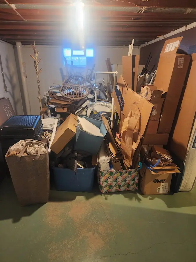 Roll-off dumpster container at job site for 4 Yard Dumpster Rental in Dyersville